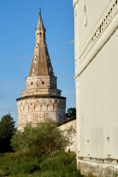 istock Tower of an ancient russian monastery on blue sky background 1056874608