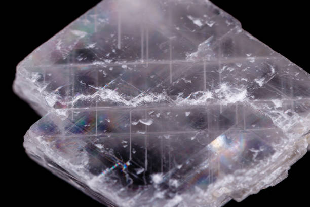 istock Macro mineral stone Iceland spar on black background 1056874704