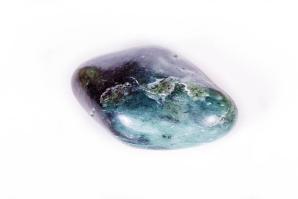 istock Macro Mineral Stone Jade Brazilian on white background 1056874814