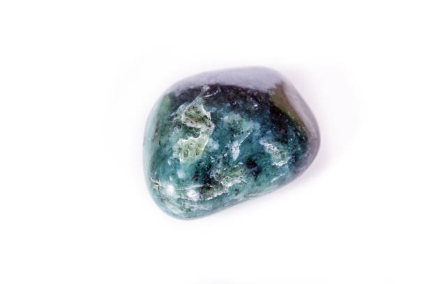 istock Macro Mineral Stone Jade Brazilian on white background 1056875276