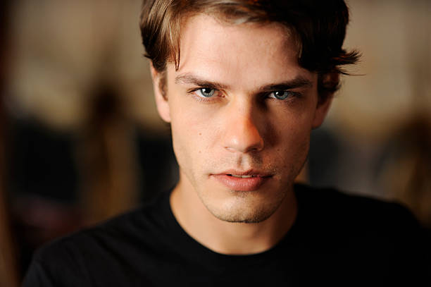 istock Portrait of a young man in the dark interior 105687763