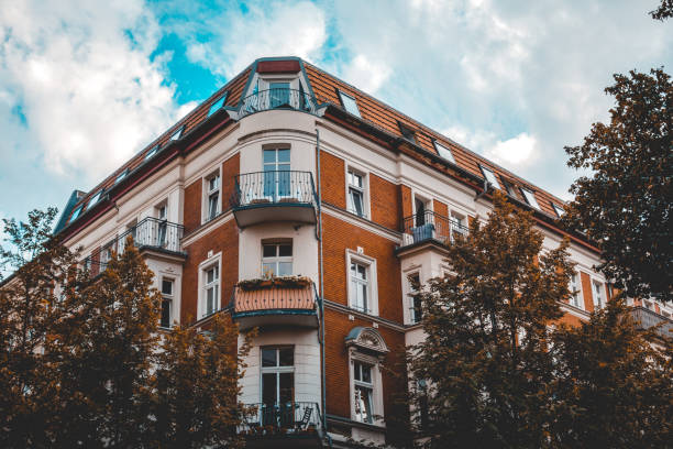 istock red colored brick building at berlin with white details on the windows 1056878964