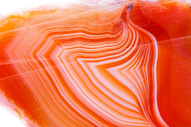 istock Macro mineral orange agate in crystals on white background 1056882246