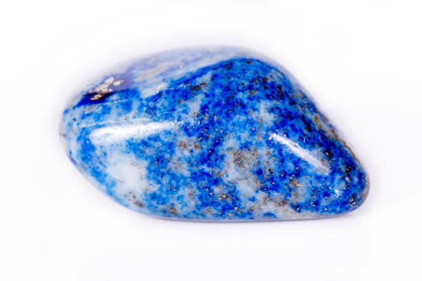 istock Macro mineral stone blue lapis lazuli (afghanistan) on white background 1056884226