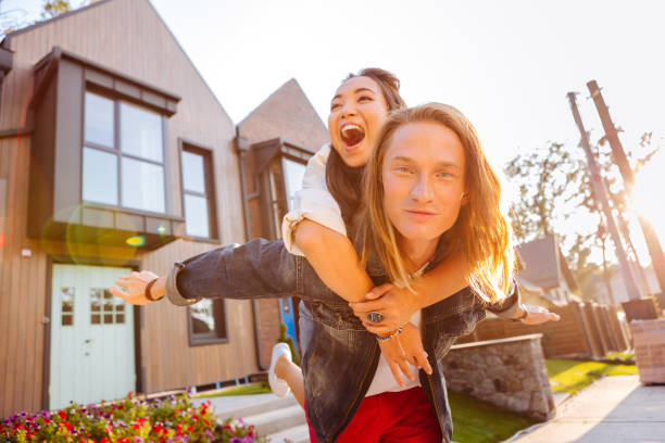 istock Positive happy young couple being just married 1056884336