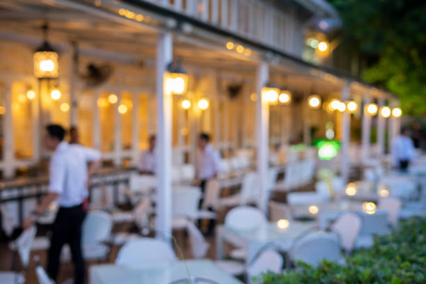 istock Blurred background of restaurant with people. 1056893792