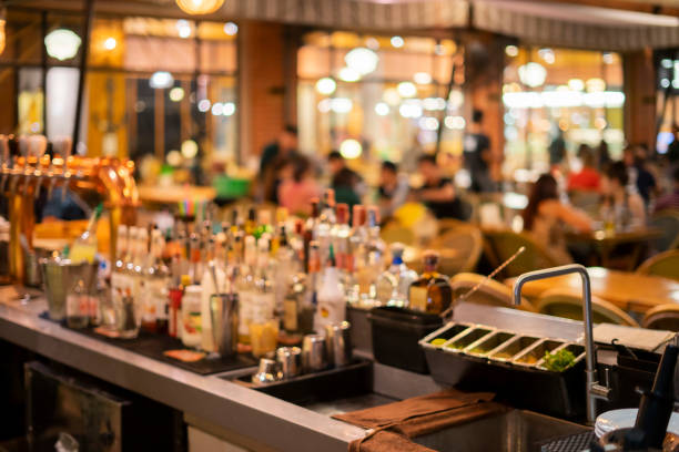 istock Blur light in pub or bar and restaurant at night party background. 1056893822