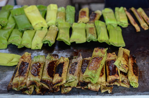 istock Pulot, Grilled sticky rice filled with banana leaves 1056896308
