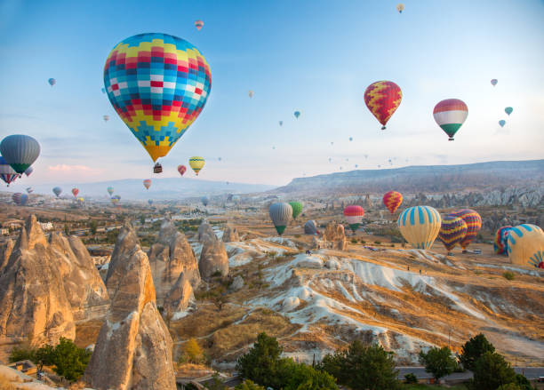 istock Hot air balloon flying over Cappadocia, Turkey 1056897886