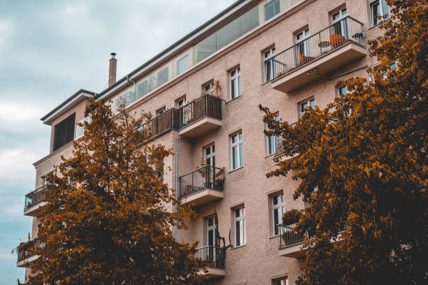 istock typical autumn scene of building at berlin with orange trees 1056901024