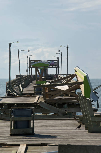 Damage to the Bouge Inlet Fishing Pier Some of the damage to the Bouge Inlet Fishing Pier from Hurricane Florence emerald isle north carolina stock pictures, royalty-free photos & images