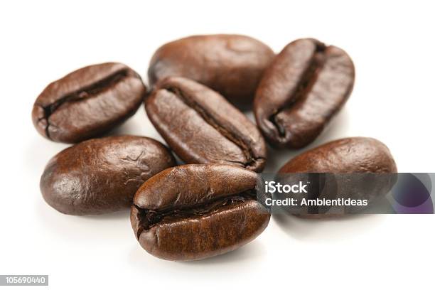 Brown Coffee Beans On A White Background Stock Photo - Download Image Now - Brown, Close-up, Coffee - Drink