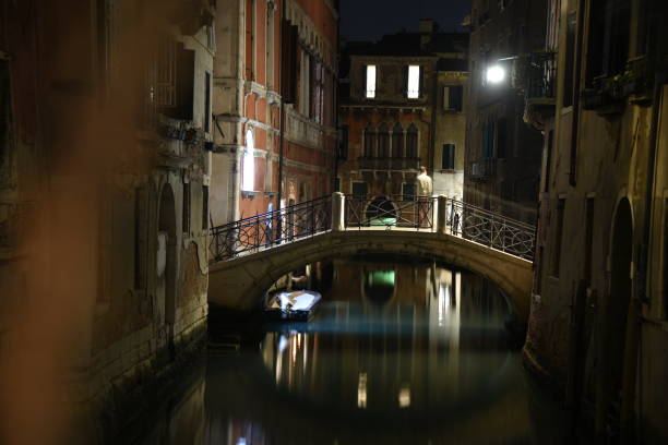 Night view of a bridge on a canal in Venice