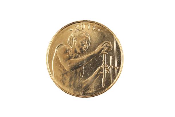 istock Golden 25 West African Franc coin on a white background 1056912680