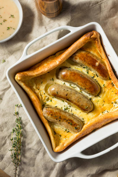 homemade english toad in the hole - yorkshire pudding imagens e fotografias de stock