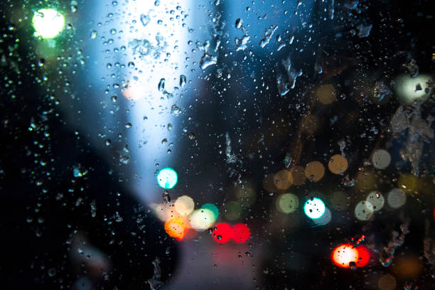 istock Rain drops on the window and traffic lights 1056915674