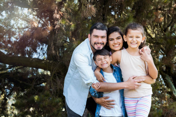 istock Family embraced in the garden 1056917420