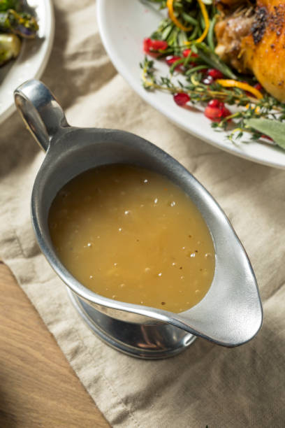 istock Dark Homemade Turkey Gravy 1056917584