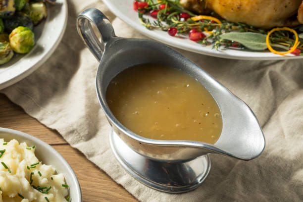 istock Dark Homemade Turkey Gravy 1056918004