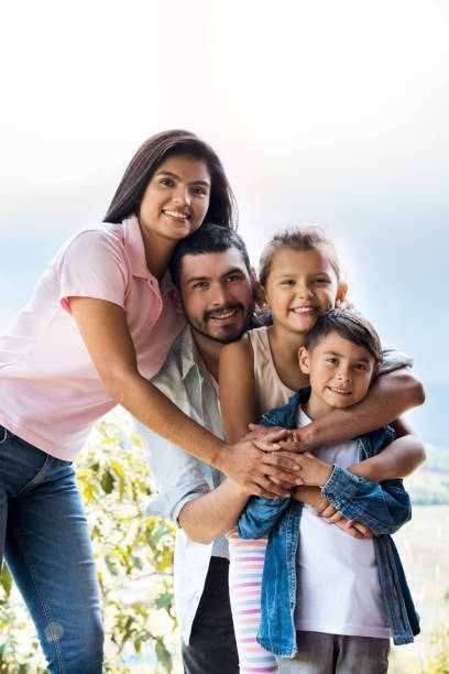istock Family embraced in the garden 1056918230