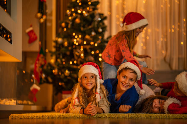 istock Children enjoying on Christmas Eve 1056921342
