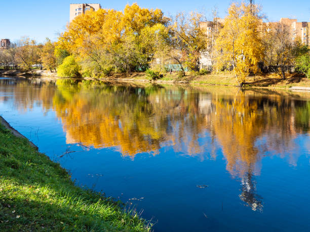 istock river in urban park in sunny autumn day 1056926058
