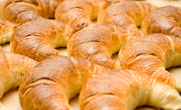 istock Breakfast - group of tasty crescent rolls 105692758