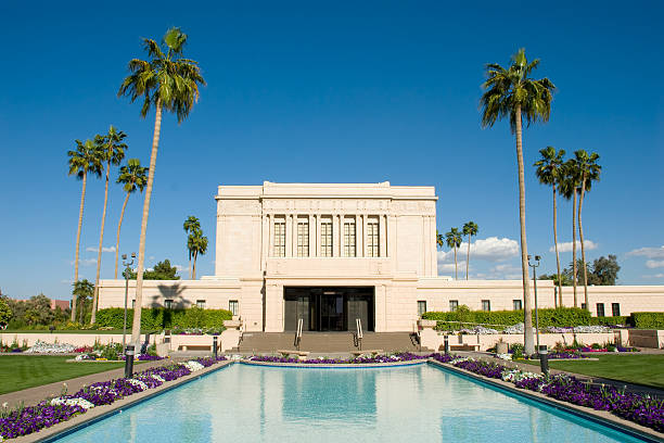 Mesa Arizona Temple with Reflection Pond and Blue Skies Mesa Arizona Temple of the Church of Jesus Christ of Latter-day Saints mesa arizona stock pictures, royalty-free photos & images
