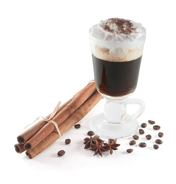 Irish coffee Glass of the Irish Coffee, coffee beens, star anise and Cinnamon coffee liqueur stock pictures, royalty-free photos & images