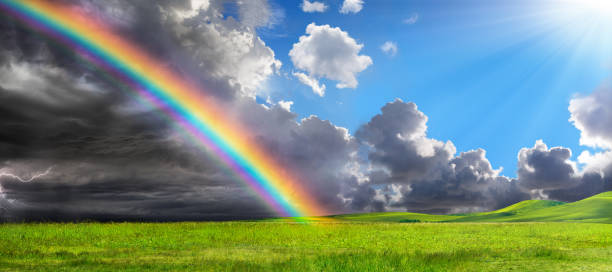 istock Rainbow In Rural Landscape - Calm After Storm 1056955538
