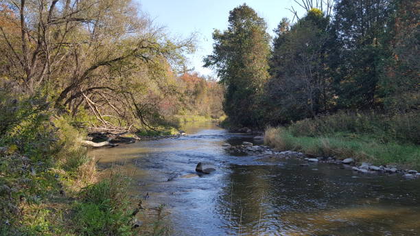 istock Beautiful Autumn River in North America/Canada 1056965806