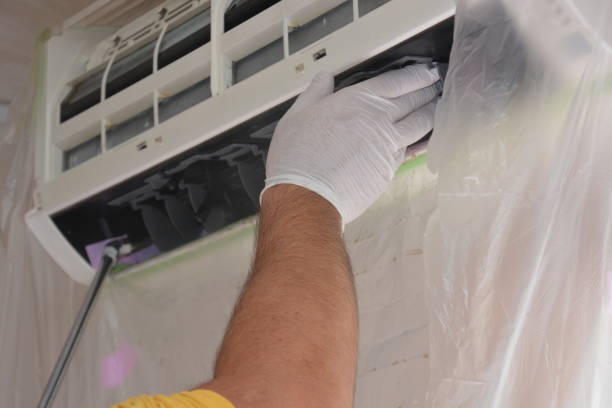 istock Cleaning work of air conditioner 1056968236