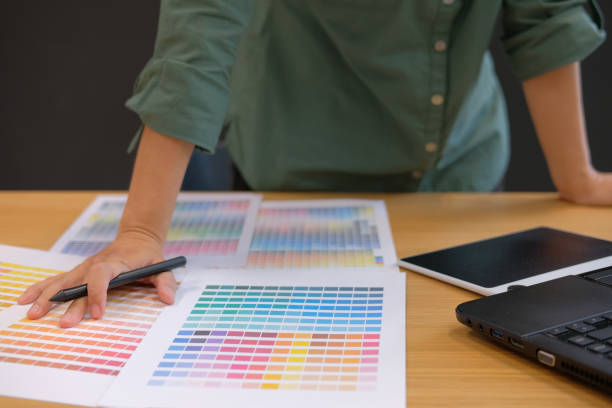 istock graphic interior designer choosing color from swatch sample catalogue palette guide 1056972136
