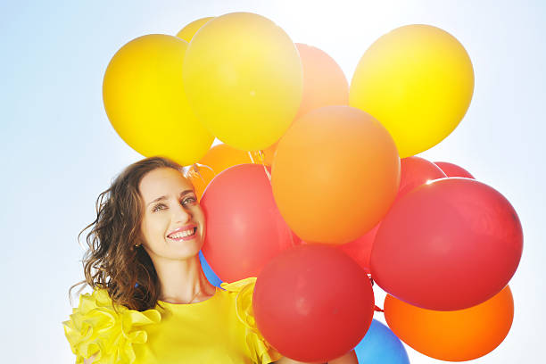 istock Woman with balloons 105697501