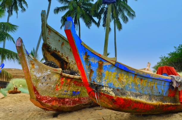 istock Abandoned Boats Moored At Beach 1056983168