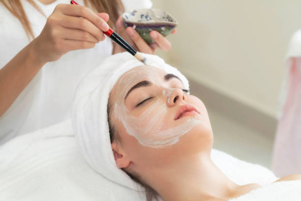 istock Beautiful woman relaxing in day spa. 1056983648