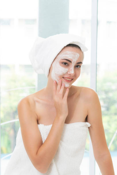 istock Beautiful woman relaxing in day spa. 1056983752