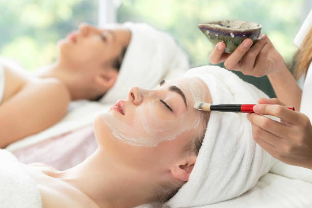 istock Beautiful woman relaxing in day spa. 1056983848
