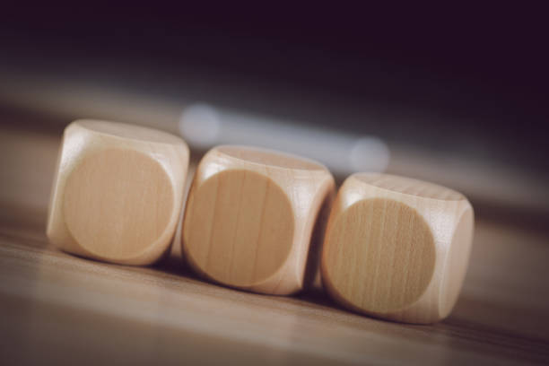 Blank wooden cube blocks on the table.