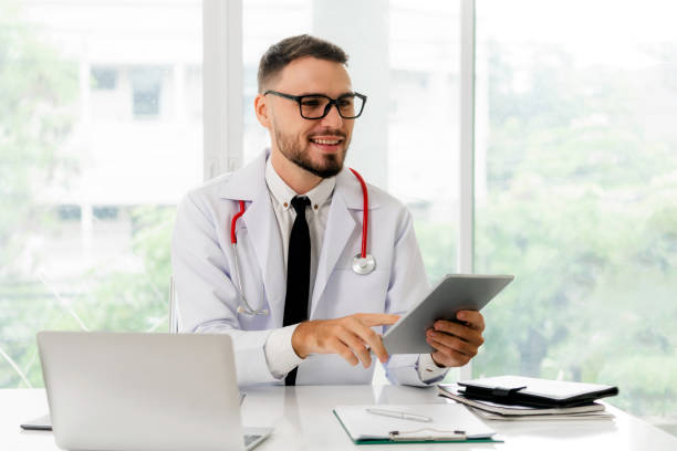 istock Doctor working on tablet computer in the hospital. 1056991786