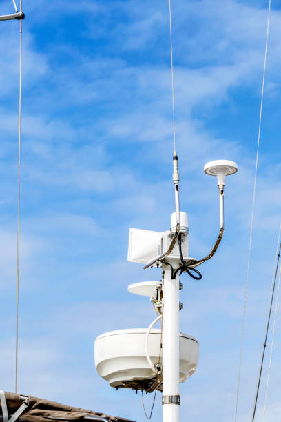istock Radar, antenna, and communication equipment on sailboat masts 1056991862