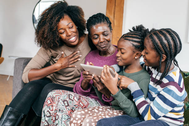 istock Watching family video together 1056995900