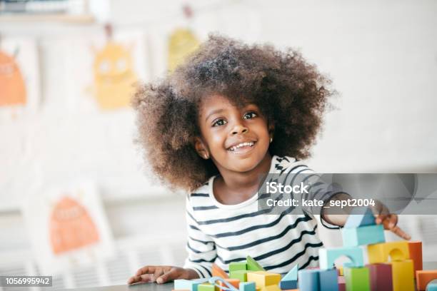 Raising A Happy And Confident Child Stock Photo - Download Image Now - Playing, Playful, Child