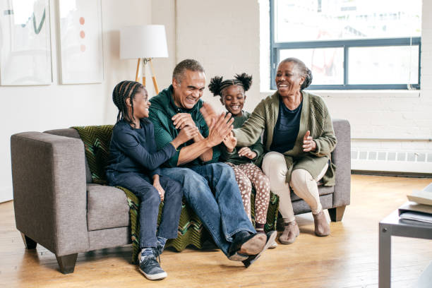 istock Grandparents and grandchildren having fun 1056995954
