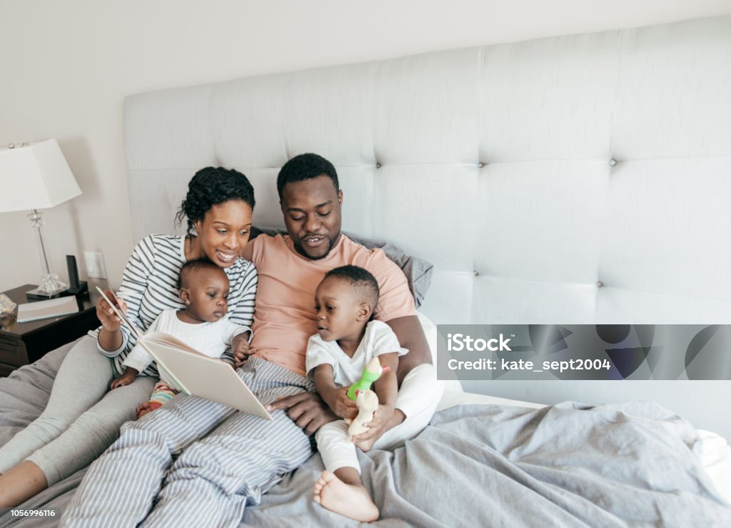 Comfortable Sleepwear Stock Photo - Download Image Now - Family, Young  Family, Bed - Furniture - iStock