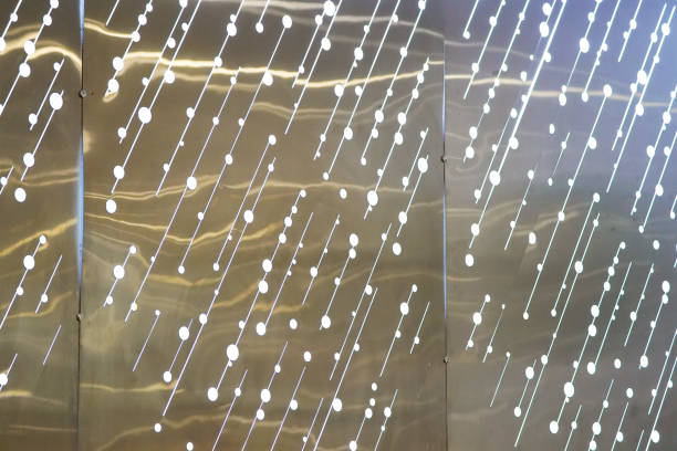 istock Luxury stainless wallpaper with punch to circle shape and insert light inside. 1056997474