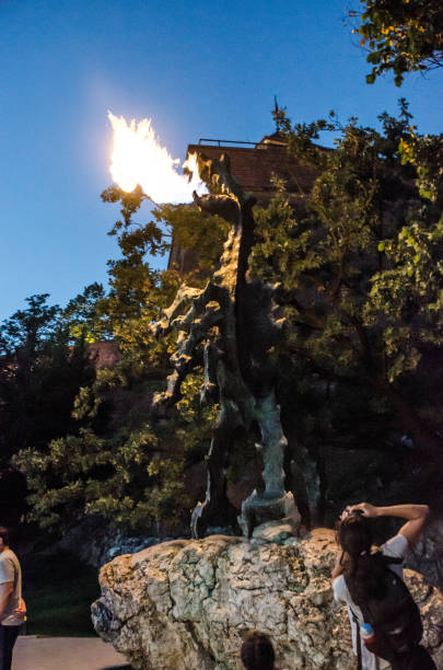 Wawel dragon throwing up fire.He is situated in a cave under Wawel Hill in Krakow,Poland.
