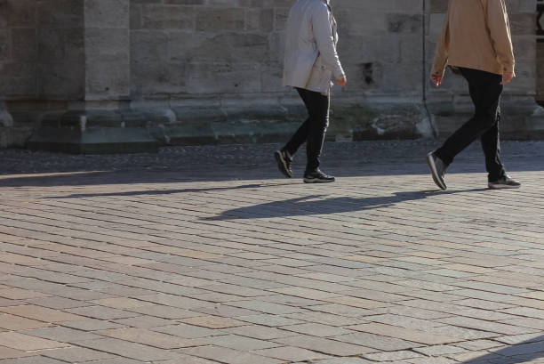 istock senior couple walk on cathedral place 1056999520