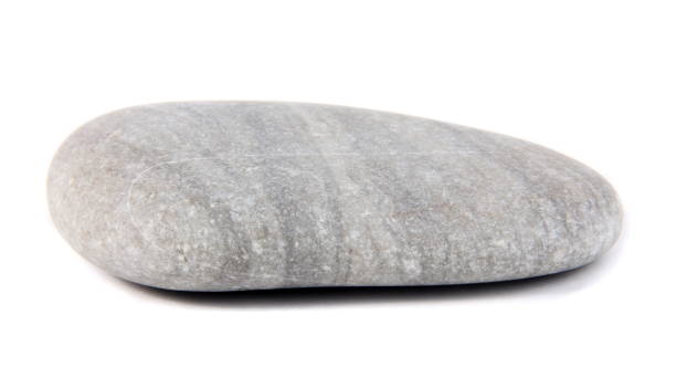 istock Close-Up Of Pebble Against White Background 1056999934
