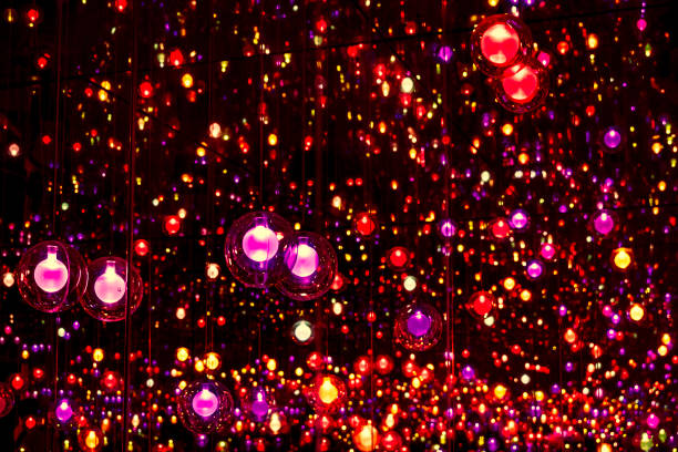 istock Red glitter christmas balls hanging particles background 1057010776